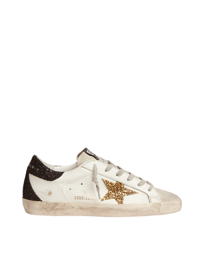 Golden goose Women’s Super-Star in nappa leather with gold glitter star and black glitter heel tab